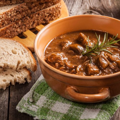 Goulash soup with pork and mushrooms.